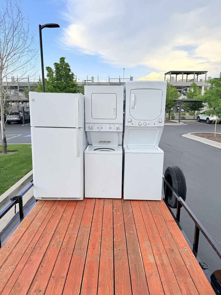 White Appliances Lot - Refrigerator and Stacked Laundry Units