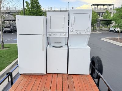 White Appliances Lot - Refrigerator and Stacked Laundry Units