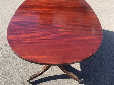 Vintage Duncan Phyfe style Oval Wooden Dining Table with Double Pedestal Base and Casters