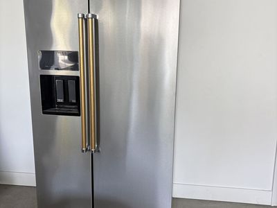 KitchenAid Stainless Steel Side-by-Side Refrigerator with Gold Handles