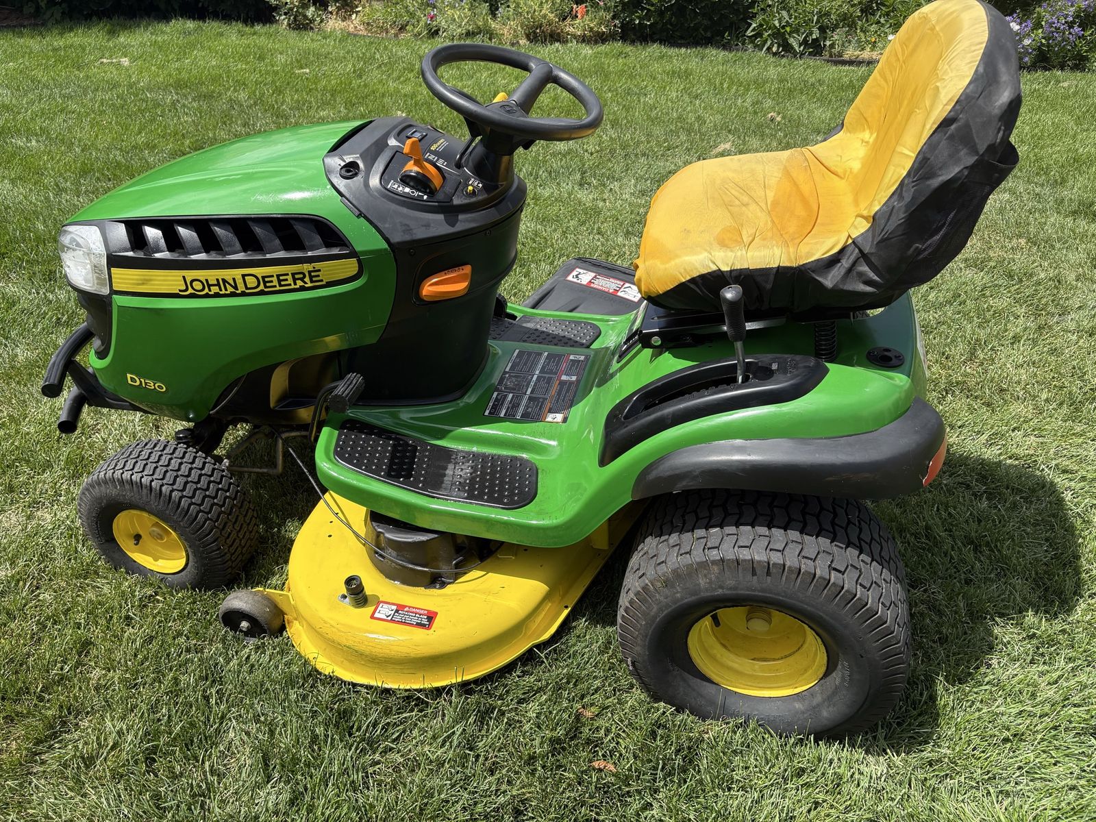John Deere D130 Riding Lawn Mower - snow blower and bagger
