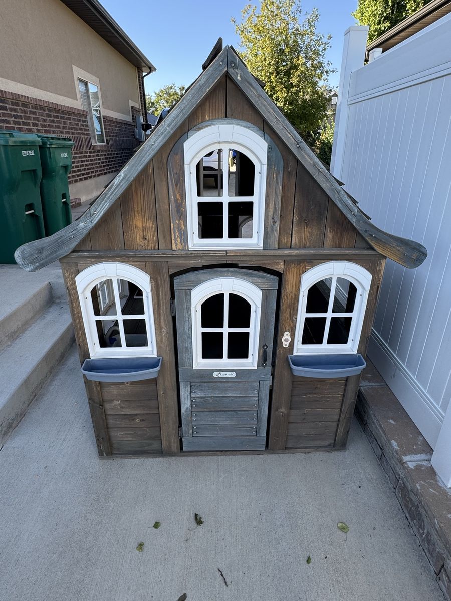 KidKraft Wooden Outdoor Playhouse with White Trim and Window Boxes