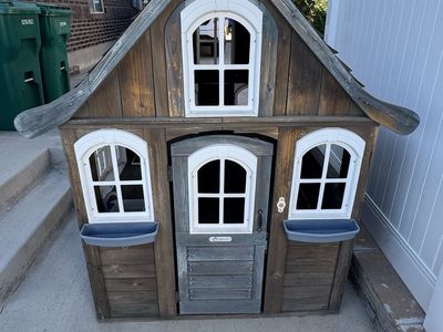 KidKraft Wooden Outdoor Playhouse with White Trim and Window Boxes