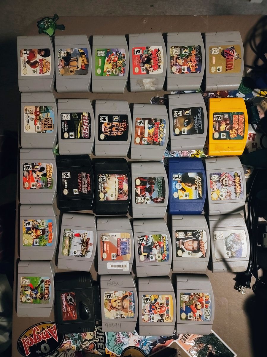 Nintendo 64 N64 27 games, gameshark, 7 controllers, transfer pack, memory cards