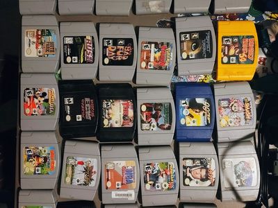 Nintendo 64 N64 27 games, gameshark, 7 controllers, transfer pack, memory cards