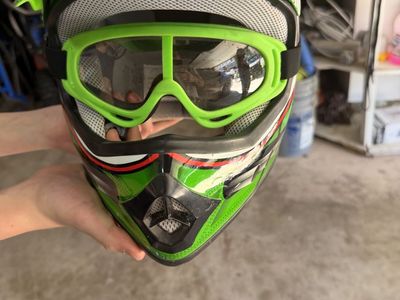 Youth motocross helmet, goggles, pants, and gloves set