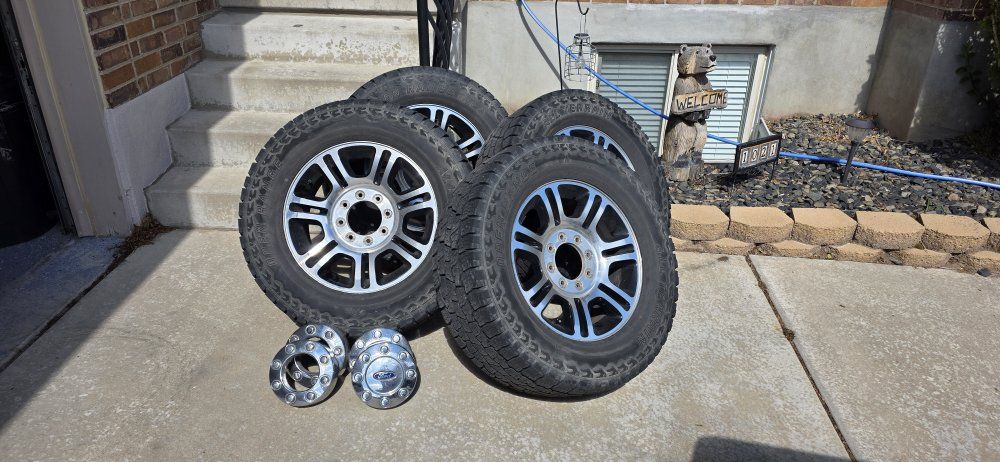 stock 2012 f350 wheels and open range tires