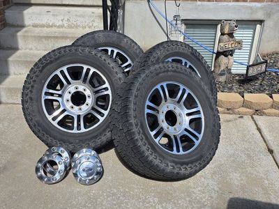 stock 2012 f350 wheels and open range tires