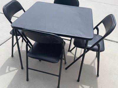 5 piece Black padded card table and chairs. $49