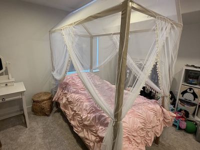 Twin House Frame Canopy Bed with Sheer Curtains - Perfect for a Child's Room