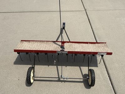 Craftsman lawn thatcher