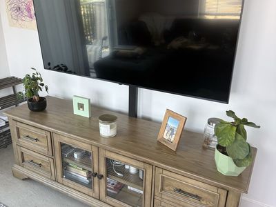 LG 65-inch 4K UHD Smart TV - Used, Excellent Condition with entertainment center