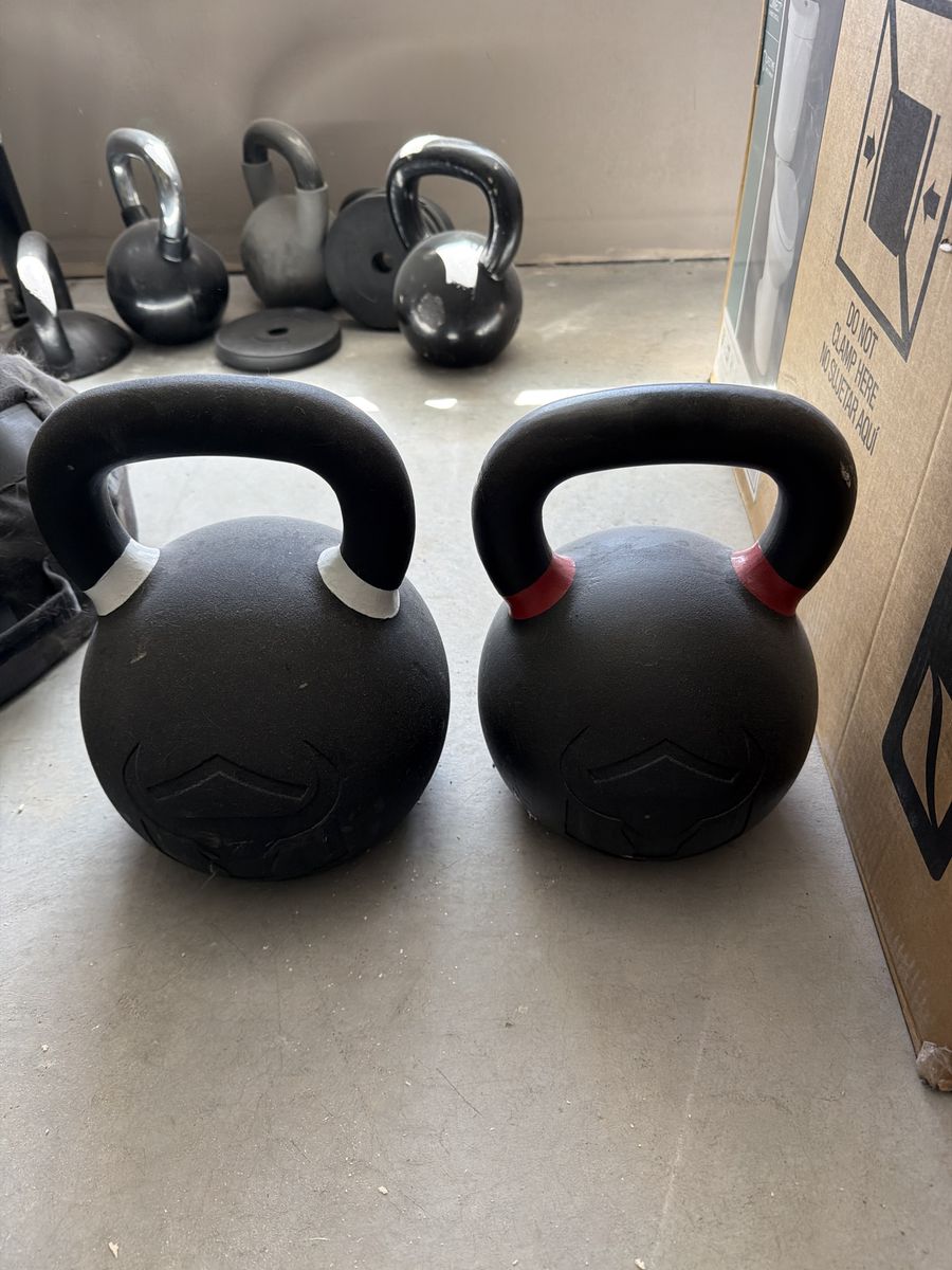 Pair of Used Kettlebells - 88lb & 70lb Weights for Strength Training