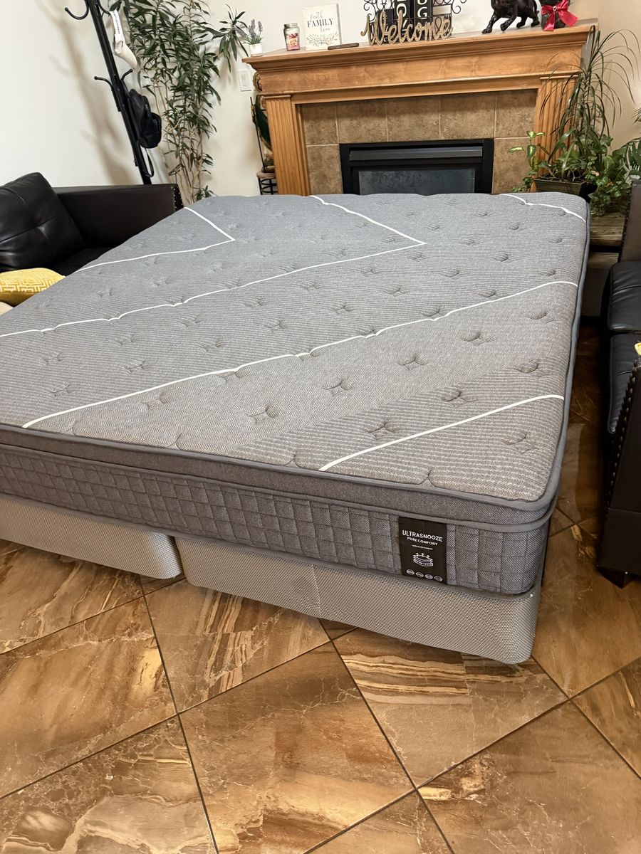 Ultrasnooze Pure Comfort Mattress with Box Springs and metal frame is a king size $180