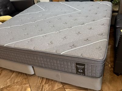 Ultrasnooze Pure Comfort Mattress with Box Springs and metal frame is a king size $180