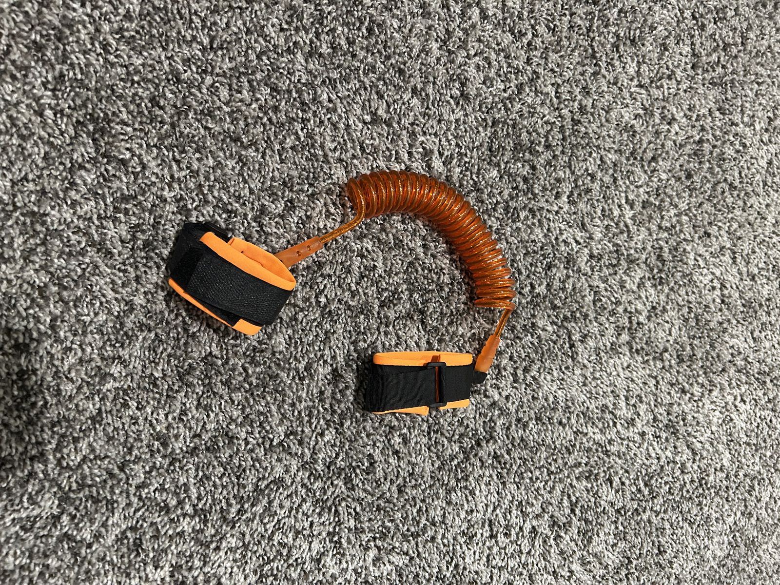 Orange Coiled Child Safety Leash/Tether with Wrist Strap