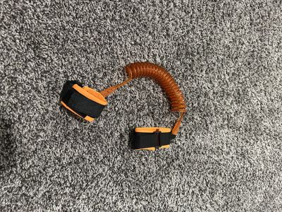 Orange Coiled Child Safety Leash/Tether with Wrist Strap