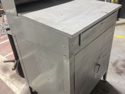 Vintage 1930 Steel Railroad Counter with shelving within cabinet cabinet