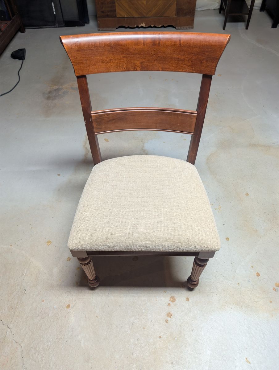 Pair of wood chairs with fabric cushion