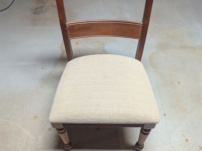 Pair of wood chairs with fabric cushion