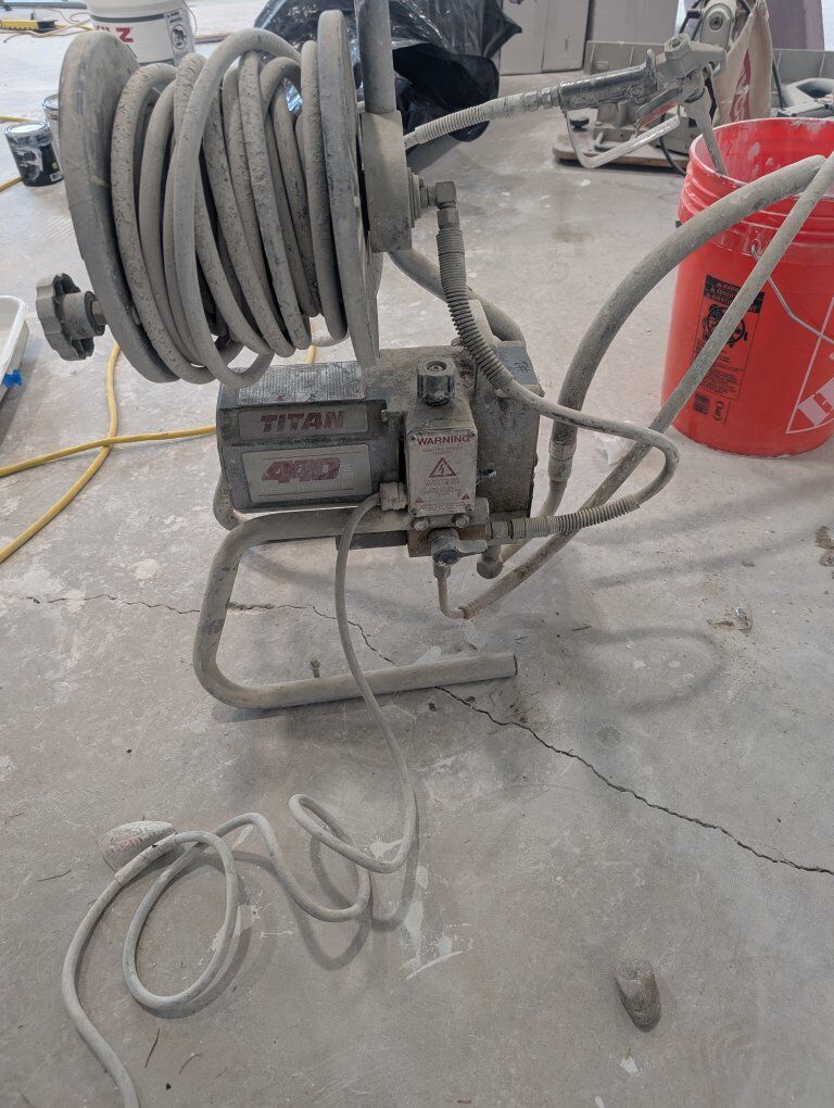 titan paint sprayer w/ EZ10 hose reel + Graco gun