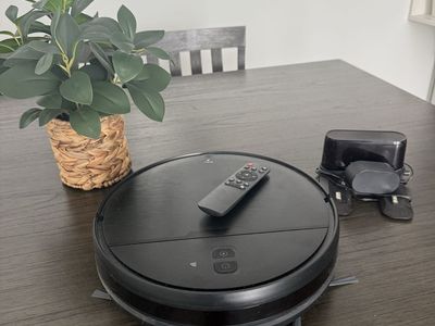 Smart Robotic Vacuum with Remote Control and Charging Base