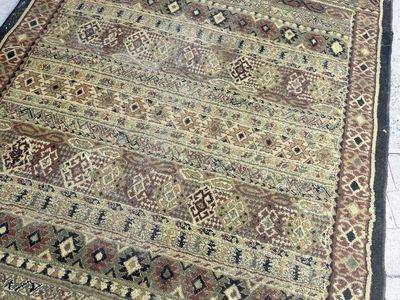 Dark Rug 5’2” x 7’6”