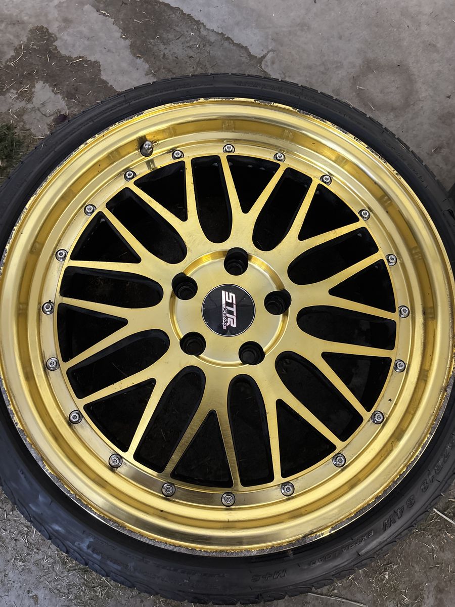 20” gold rims w/tires