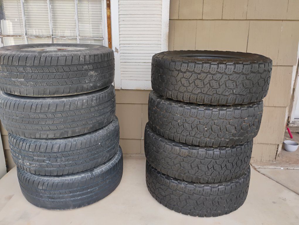 265/70/17 GMC Wheels/Tires + (4) Toyo Open Country Tires