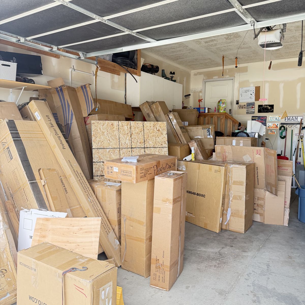 Yard sale full of Unopened Boxed Items: , Planter Boxes, loveseat Sofa &outdoor storage, new furniture.