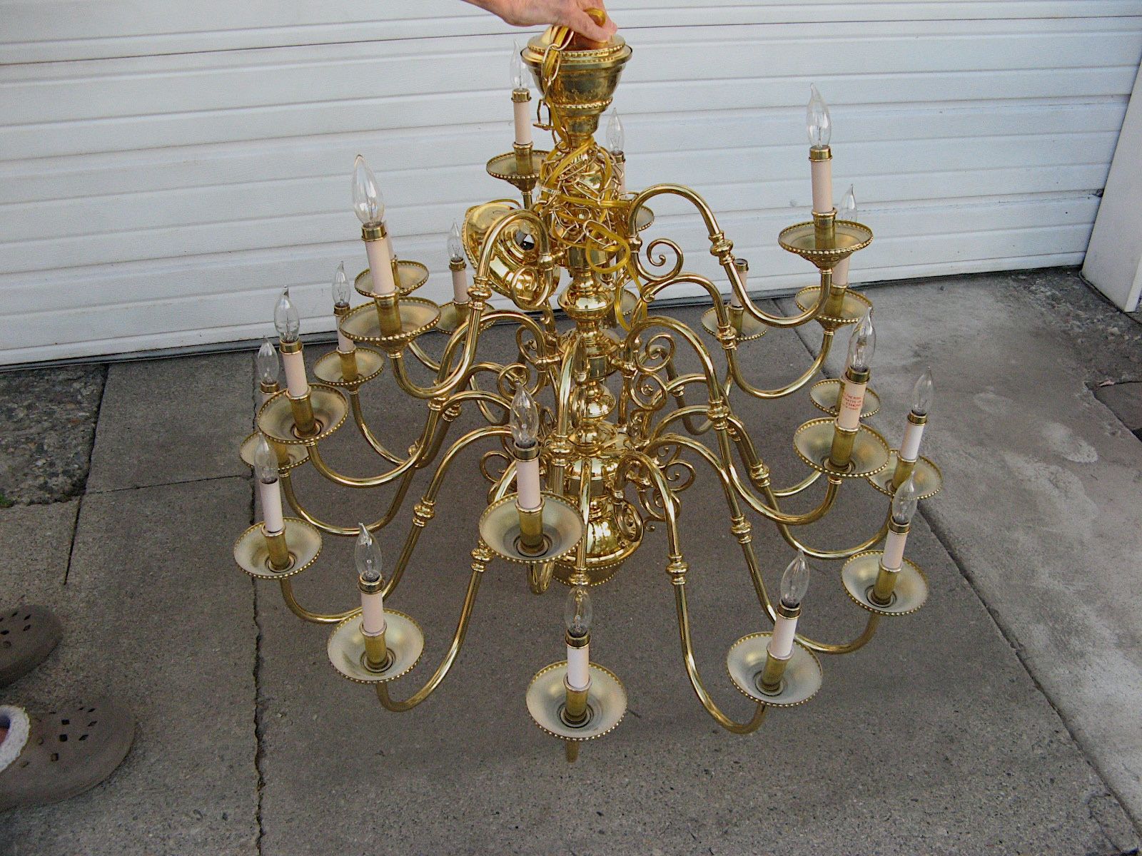 Dutch style chandelier made of brass with a glossy finish, it has 18 arms & bulbs