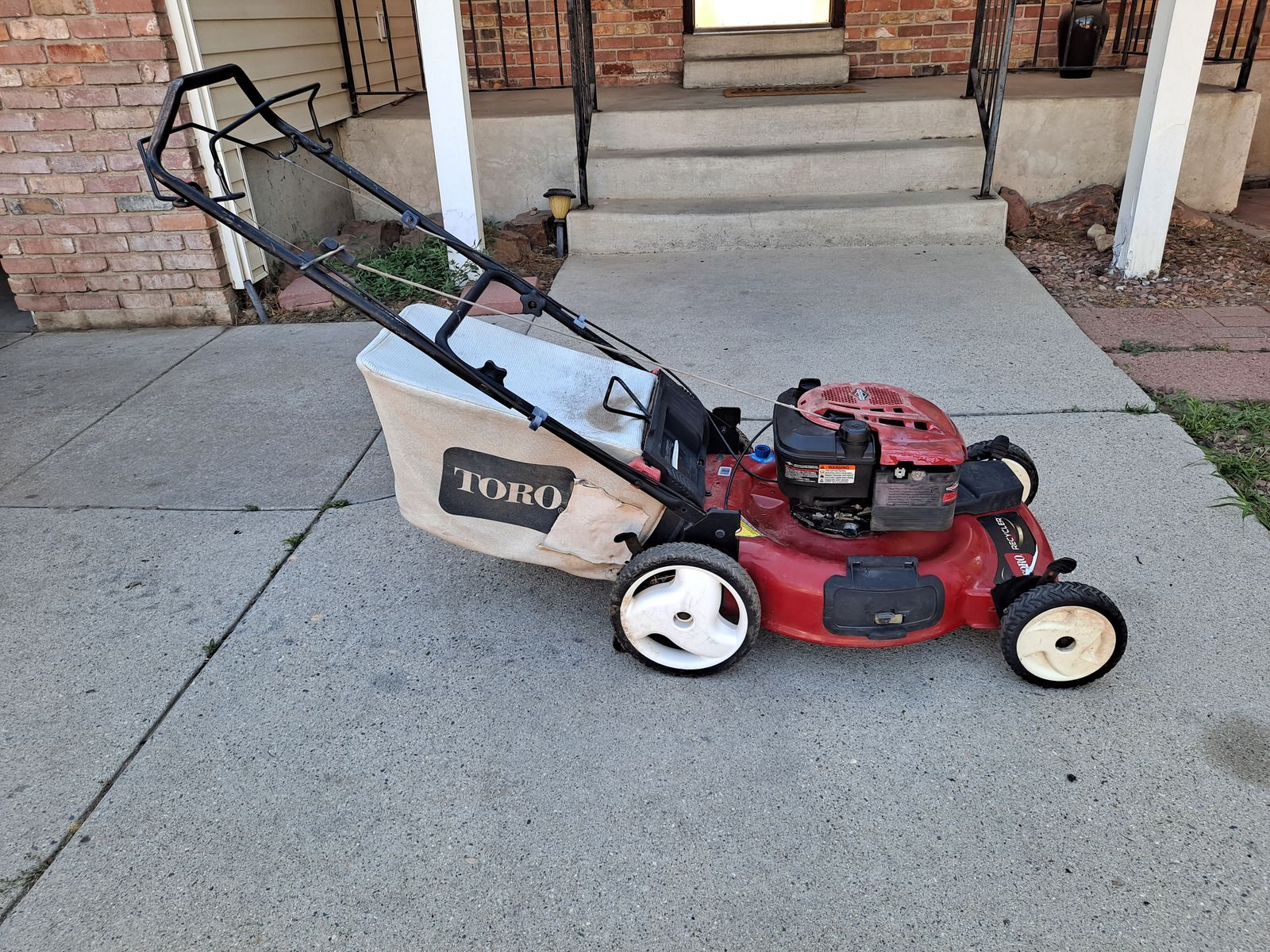 Toro self propelled bagged mower, flawless operator