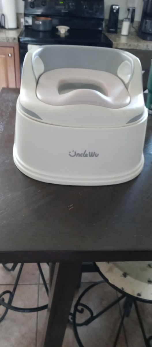 Uncle we potty chair