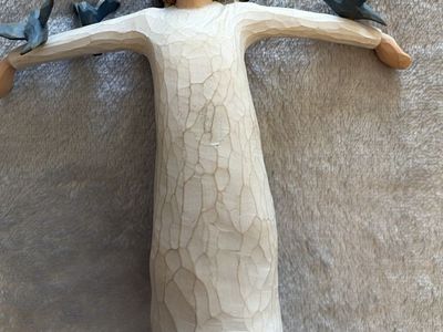 "Happiness" figure from the Willow Tree collection