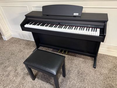 Electric piano with bench