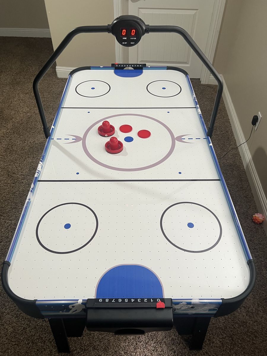 Kids air hockey table
