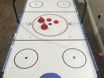 Kids air hockey table