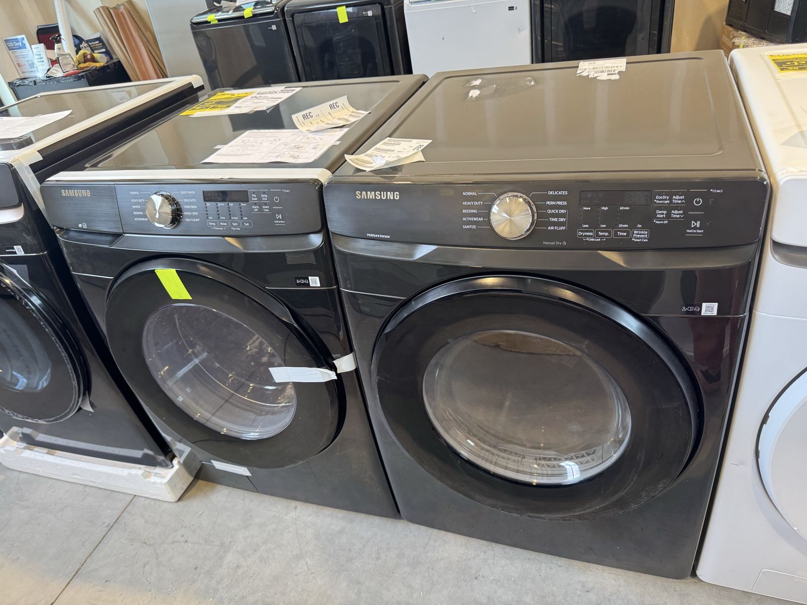New open box Samsung 4.5 cu. ft. Front Load Washer with Vibration Reduction Technology+ and 7.5 cu. ft. ELECTRIC Dryer
