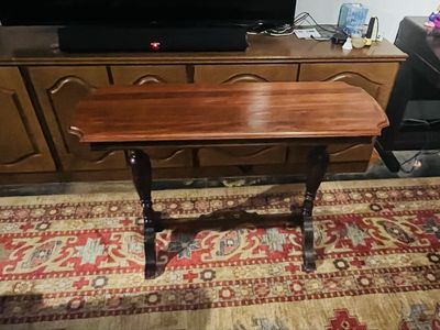 Vintage Dark Wood Console Table - Carved Legs, Scalloped Top. $100