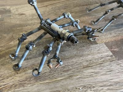 Handmade Metal Scorpion Sculpture - Unique Industrial Art from Nuts, Bolts, and Spark Plug