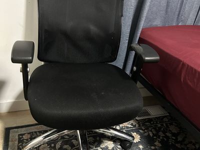 Black Mesh Ergonomic Office Chair with Chrome Base and Adjustable Armrests