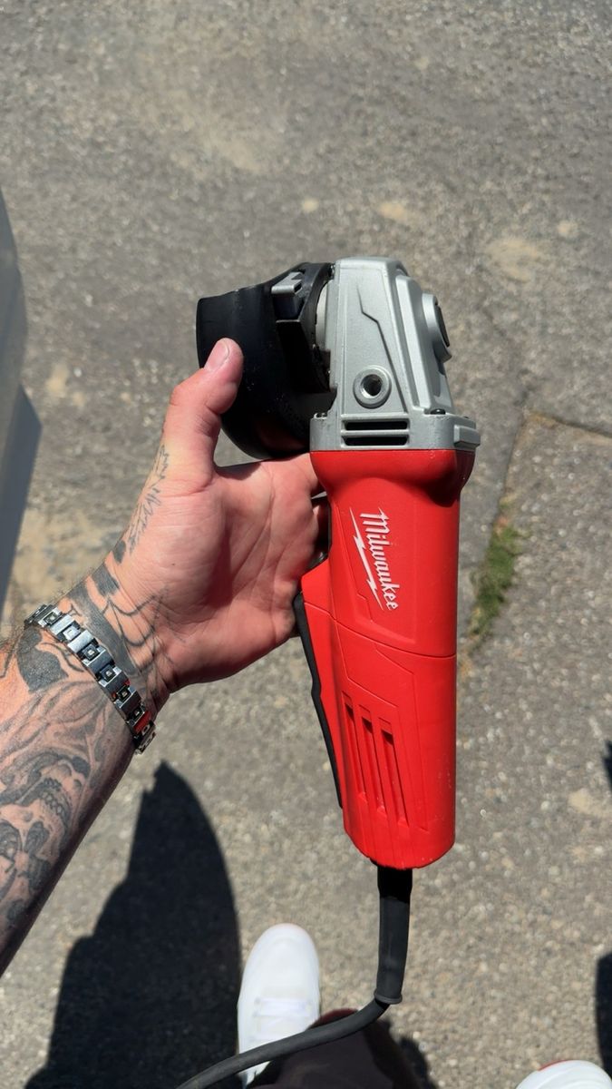 Milwaukee Heavy-Duty Corded Angle Grinder with Accessories and Manual