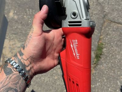 Milwaukee Heavy-Duty Corded Angle Grinder with Accessories and Manual