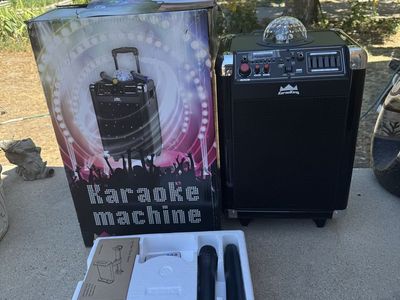 New KaraoKing Karaoke Machine Speaker System with 2 Microphones, Tablet Holder, AUX/USB/FM Radio
