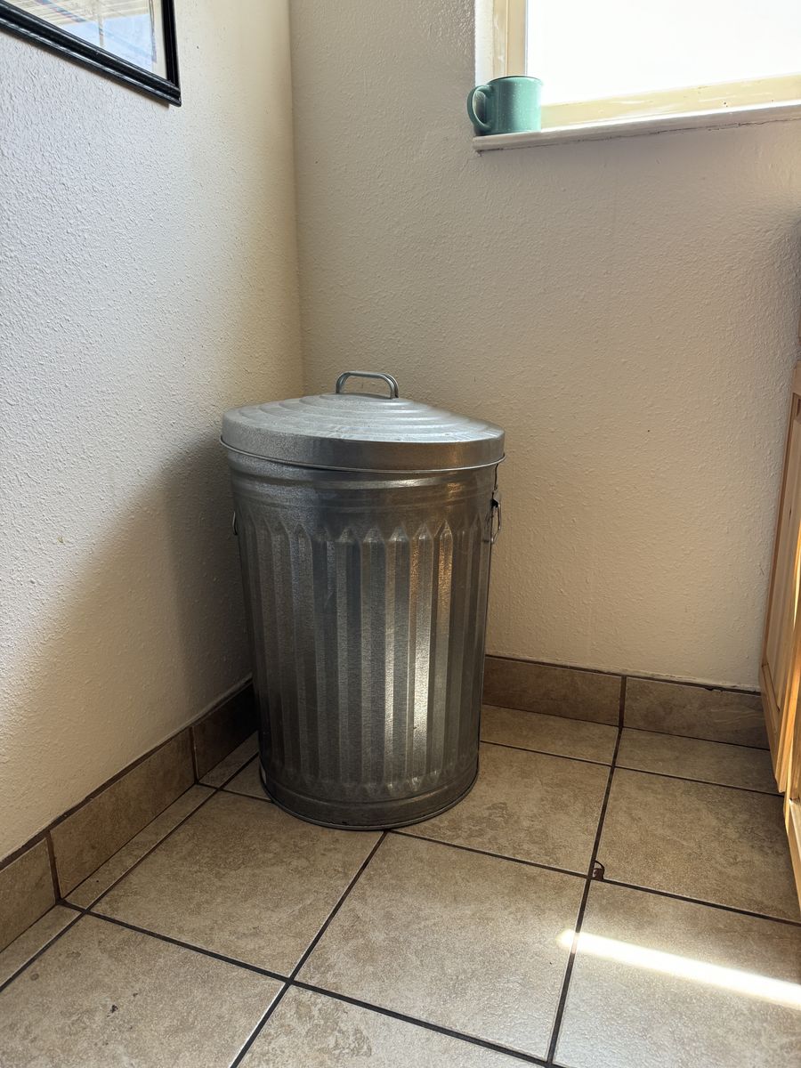 Large metal trash can