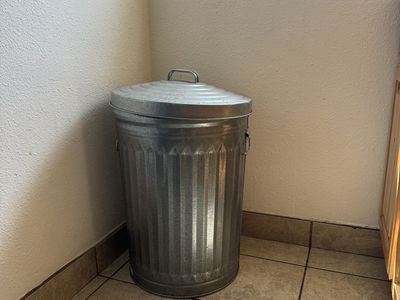 Large metal trash can