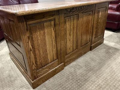 Solid oak executive desk with swivel wooden chair