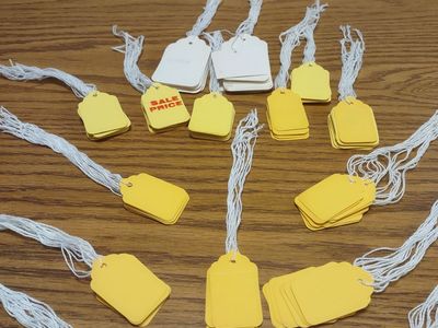 PRICE TAGS ON STRINGS