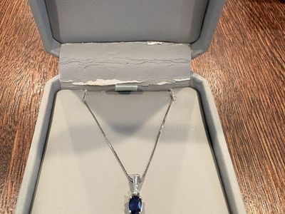 Blue sapphire, and diamond necklace