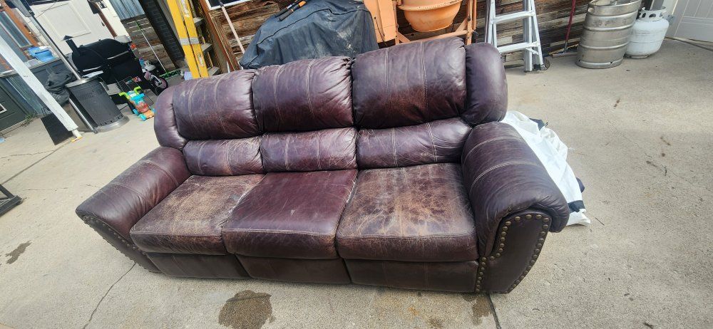 Brown Leather Reclining Sofa with Nailhead Trim